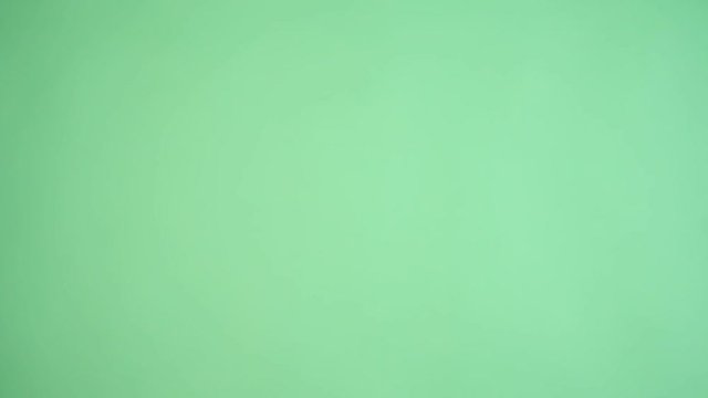 Mans hand show thumbs up gesture. Male hand  do thumbs up. Like. keyed green screen.