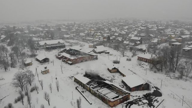Aerial view of abandoned saltmaking factory in Drohobych. Smooth flight straight ahead, 4k