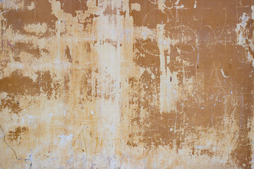 Light yellow rough stucco background wall texture