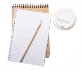 Notebook pencil cardboard cup coffee on white background isolation, top view