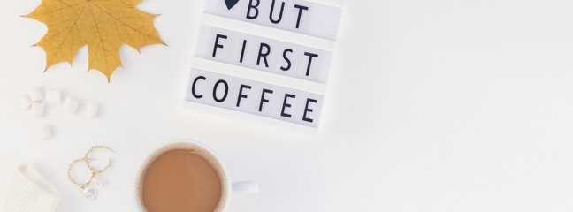 But first coffee text on lightbox with Coffee Cup