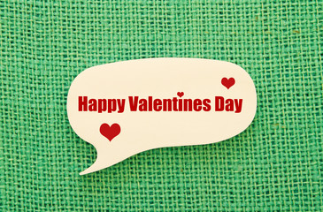 Happy Valentines Day written on a paper.