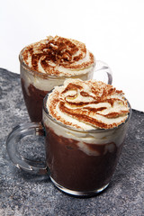 Hot chocolate cocoa with whipped cream for xmas on table
