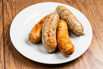 sausages on the white plate