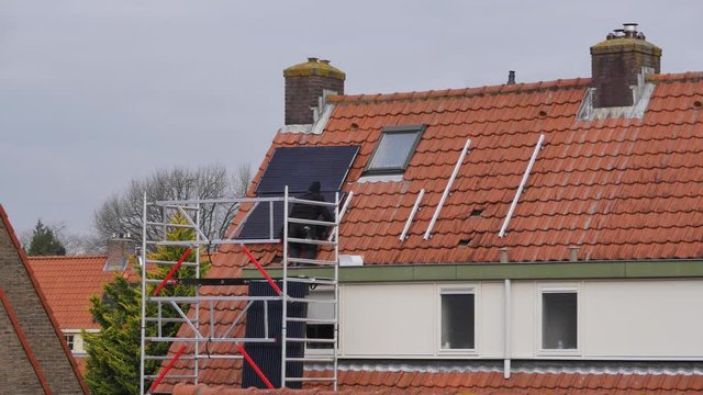 Timelapse of placing solar panels to a house