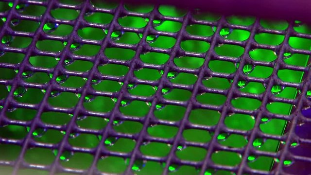 Close-up grille of hydrofilter of air purification using water filter.
