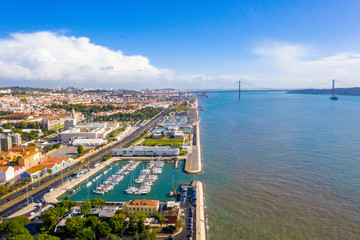 Aerial view of the Tagus river near Belem tower in Lisbon, Portugal.