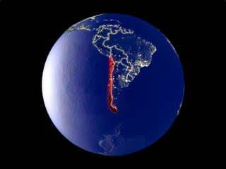 Chile from space on model of planet Earth with city lights. Very fine detail of the plastic planet surface and cities.
