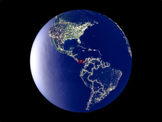 Panama from space on model of planet Earth with city lights. Very fine detail of the plastic planet surface and cities.