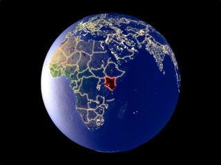 Kenya from space on model of planet Earth with city lights. Very fine detail of the plastic planet surface and cities.
