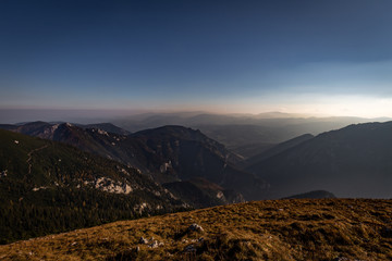 View from the Schneeberg to Rax valley near Stadelwand with scenic blue sky, Alpen, lower Austria