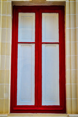 Red frame closed window closeup