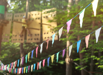 Colorful triangles in the summer park. birthday, party decor 