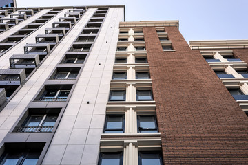 multi-storey residential building against the blue sky