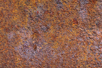 Rust on metallic surface. Rusted iron texture. Rusty metal background with copy space. Rough oxide plate close up. Strong rust. Hard decay of metal in macro. Oxidation of steel. Chemical reaction.