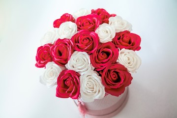 Red and White roses bouquet as a gift on St Valentine's Day isolated on a white background, view from above