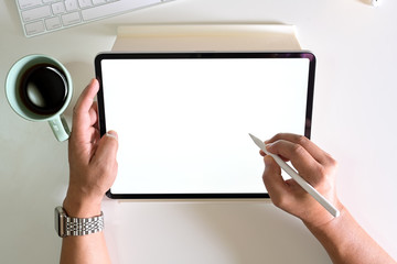 Top view designer sketch graphic drawing on digital display tablet creative  work in studio