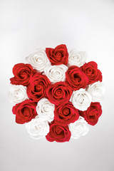 Red and White roses bouquet as a gift on St Valentine's Day isolated on a white background, view from above