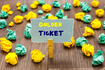 Text sign showing Golden Ticket. Conceptual photo Rain Check Access VIP Passport Box Office Seat Event Clothespin holding gray note paper crumpled papers several tries mistakes