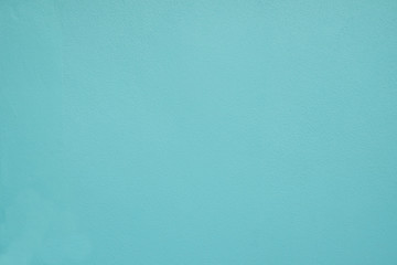 Green pastel painted wall texture. rough plaster background with copy space for design