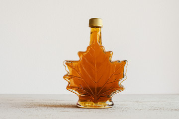 maple syrup in leaf bottle