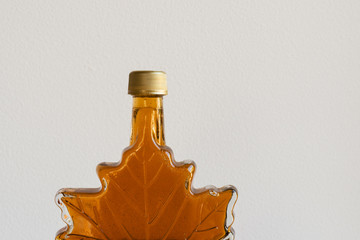 maple syrup in leaf bottle