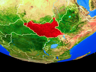 South Sudan from space on model of planet Earth with country borders.