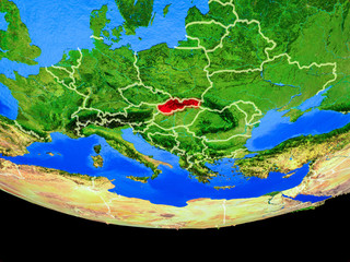 Slovakia from space on model of planet Earth with country borders.