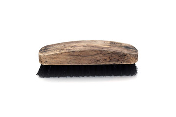 Closeup old wood shoebrush isolated on white background