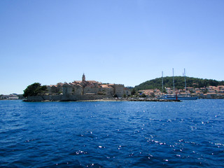 Fototapeta na wymiar Panorama of Korcula old town, homeland of Marco Polo, from adriatic sea, Croatia