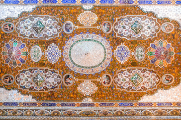 Shiraz, Iran. October 24, 2016 : Beautiful  ceiling of the Qavam House or Narenjestan e Ghavam, embellished with mirror tiles work and wood painting.