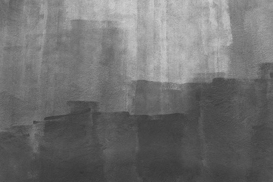 Abstract background from black color painted on white wall. Art backdrop.