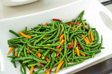 Home made food stir fry baby bean cooked with carrots