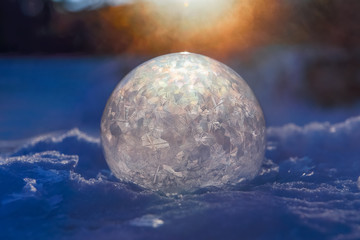 Fototapeta na wymiar Frozen bubble with ice crystals