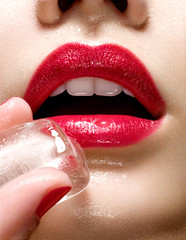 Red Lips With Ice Cube And Wet Skin