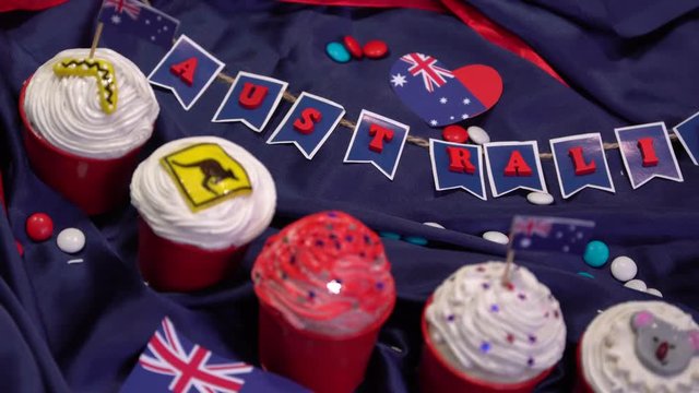 The handmade Australian cupcakes with flags, kangaroo road sign, boomerang, seven-pointed star and koala