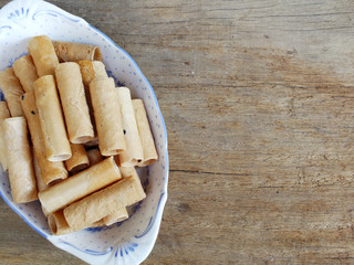 thai coconut cracker roll on wooden background