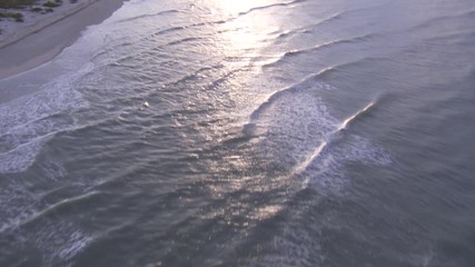 Aerial of beach at sunset