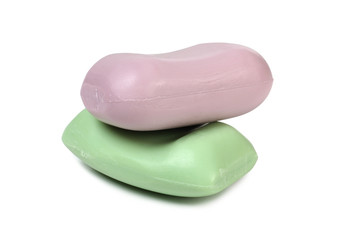 Colorful pieces of soap on white background