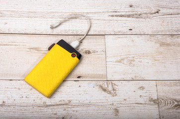 Power Bank Backup Technology Energy storage on wooden floors