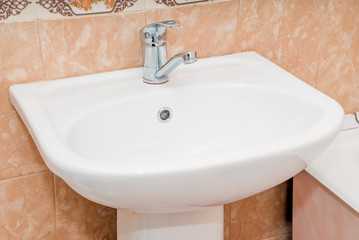 The photo of a sink in a bathroom