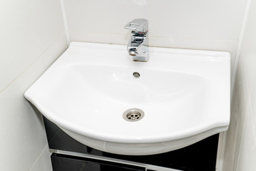 The photo of a sink in a bathroom