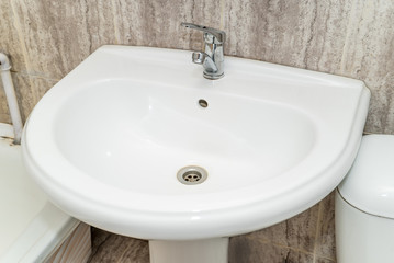 The photo of a sink in a bathroom