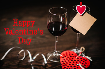 Text happy Valentine's Day. Love concept with wine, red hearts. Valentines day background. Space for text. letters on empty paper sheet, note for text message. Empty greeting card.
