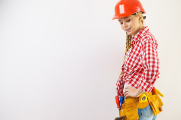 Happy woman in protective helmet