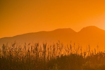 Sunrise over mountain hill