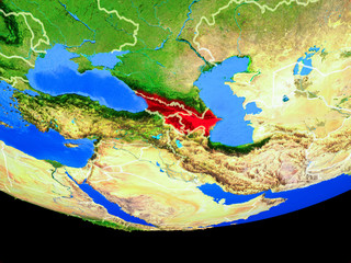 Caucasus region from space on model of planet Earth with country borders.