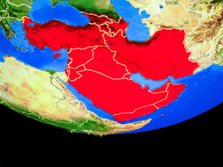 Western Asia from space on model of planet Earth with country borders.
