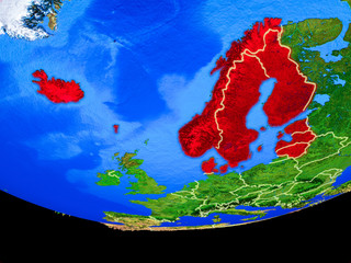 Northern Europe from space on model of planet Earth with country borders.