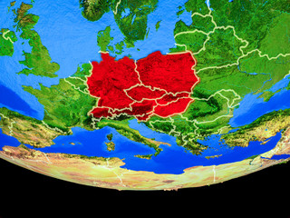 Central Europe from space on model of planet Earth with country borders.